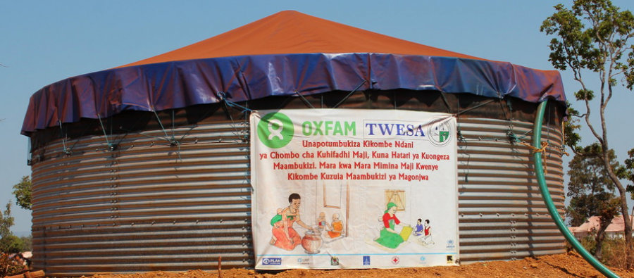 An Oxfam water tank at Nyarugusu Refugee Camp, in Tanzania. Photo: Bill Marwa An Oxfam water tank at Nyarugusu Refugee Camp, in Tanzania. Photo: Bill Marwa