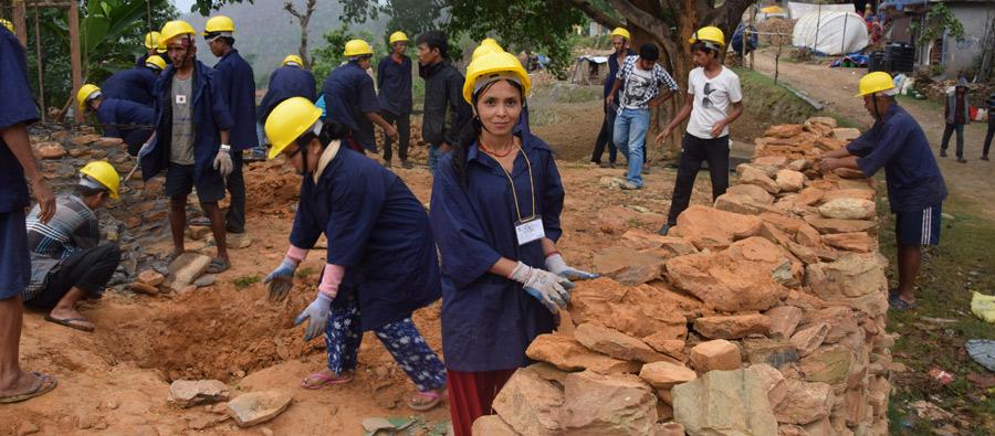 Rita Thapa and others clearing a site before starting the mason training. Photo: Bipana Dhimal/Oxfam Rita Thapa and others clearing a site before starting the mason training. Photo: Bipana Dhimal/Oxfam
