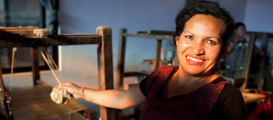 Kathmandu, Nepal: Durga Maharjan, founder and owner of a local weaving business. She learned how to weave before starting her own business making bedspreads, which also employs her sisters and sisters-in-law. Credit: Abbie Trayler-Smith/Oxfam Kathmandu, Nepal: Durga Maharjan, founder and owner of a local weaving business. She learned how to weave before starting her own business making bedspreads, which also employs her sisters and sisters-in-law. Credit: Abbie Trayler-Smith/Oxfam