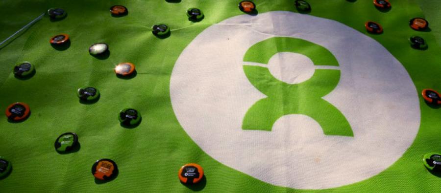 Flag and pins with Oxfam logo