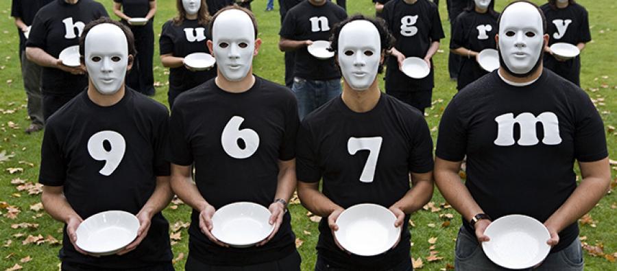 Oxfam activists campaigning in Parliament Square during a World Food Day stunt. Photo credit: Andy Aitchison/Oxfam.