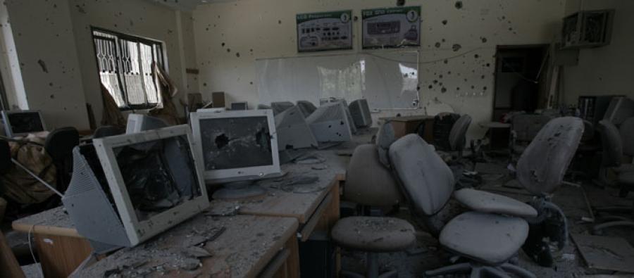 During the bombing of the past few weeks, UCAS was badly hit by tank shells Computers destroyed by tank shells, in Gaza's University College of Applied Sciences (UCAS)