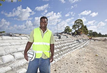A worker who helped to construct coastal defences in Tarawa, Kiribati