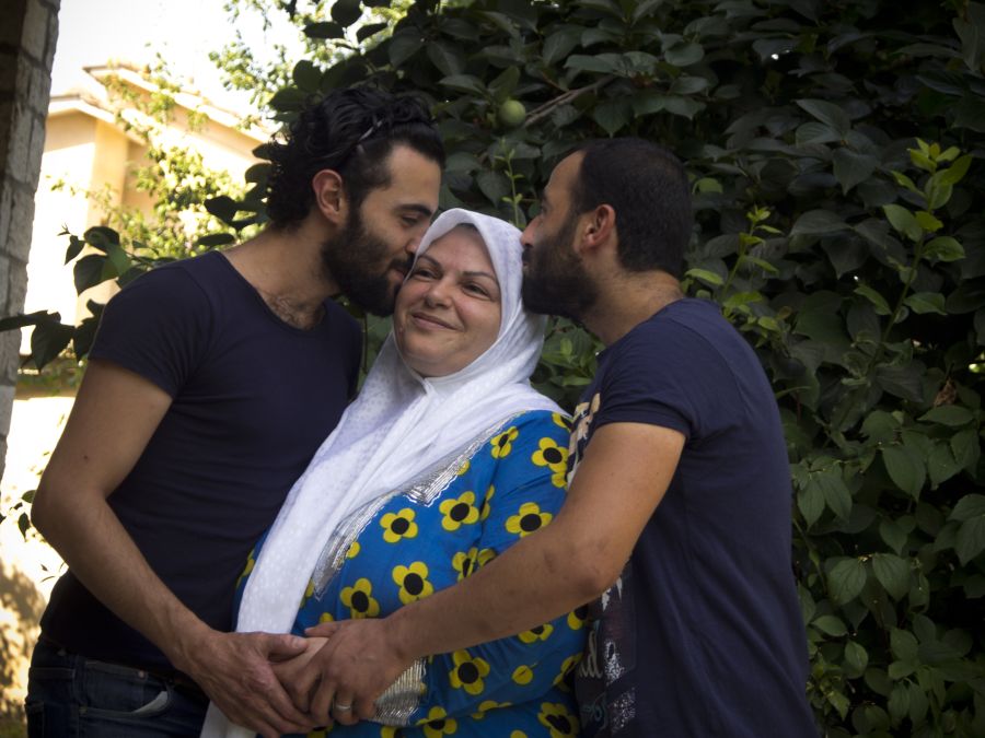 Mohammed, Mouhib and their mother Malak. Mohammed, Mouhib and their mother Malak.